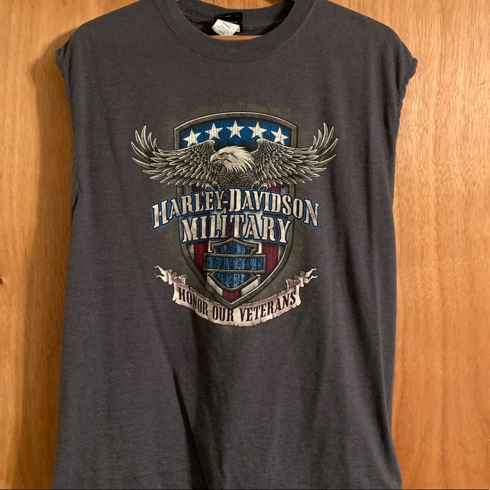 Never Worn  Harley Davidson sleeveless shirt.